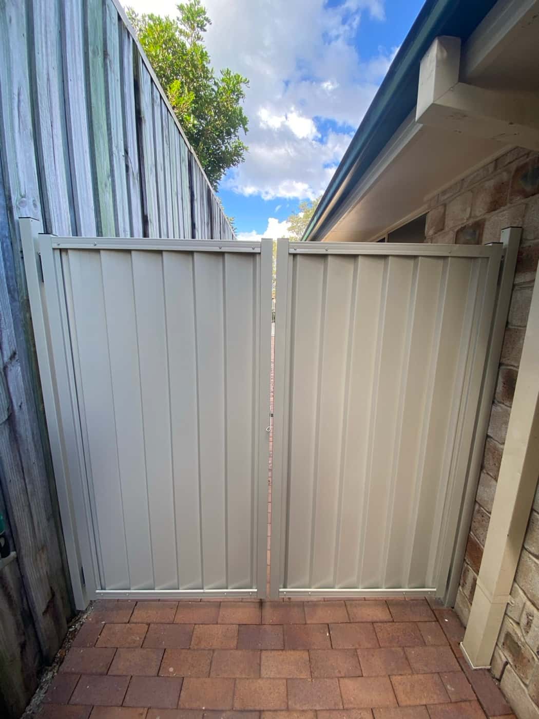 Double Colorbond side gates between house and fence